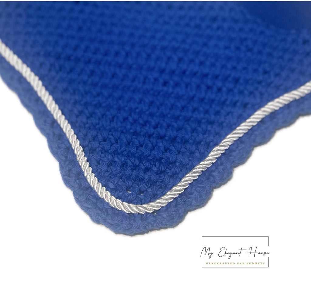 KIRKKAANSININEN PYÖREÄREUNAINEN KORVAHUPPU