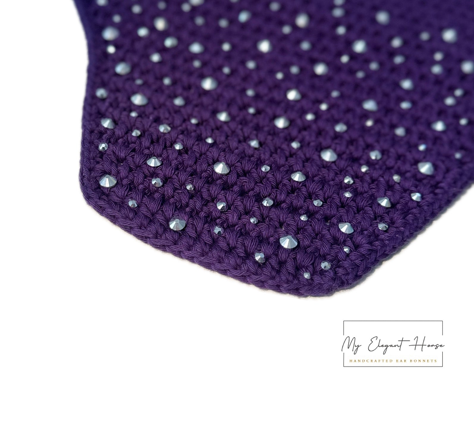 VIOLETTI NELIÖREUNAINEN KORVAHUPPU